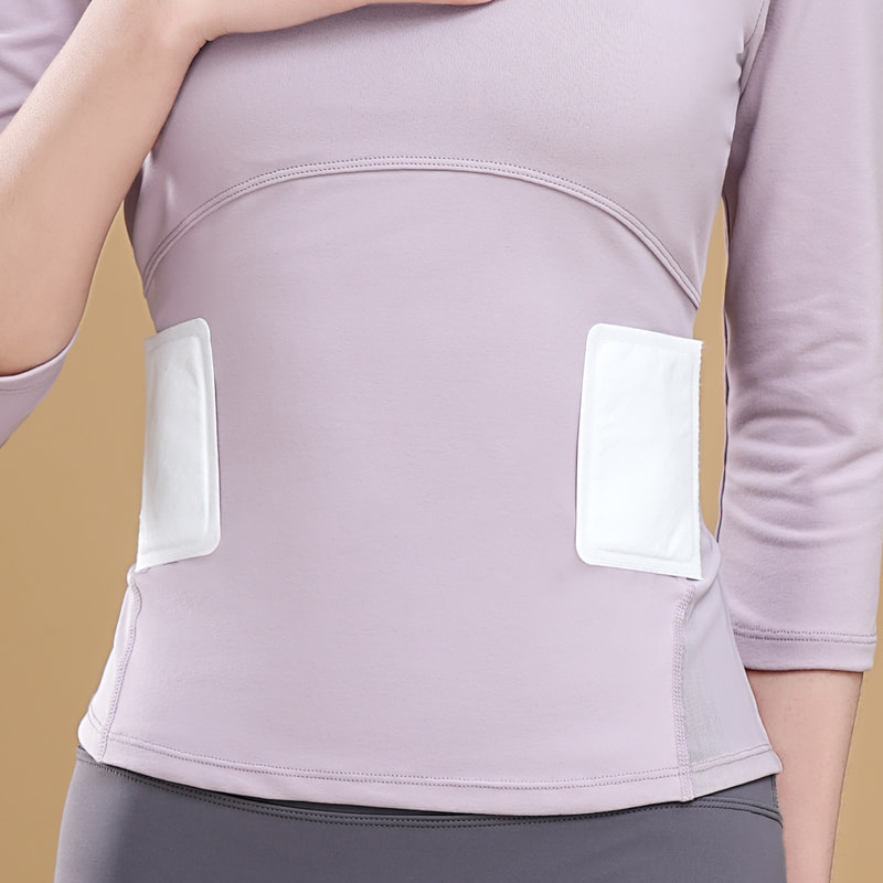 Hosszú ideig tartó melegítésű, eldobható testmelegítő tapaszok